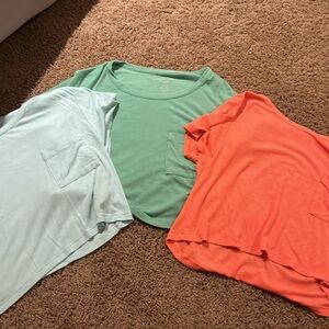 Pink, baby blue and light green/blue American Eagle shirts!